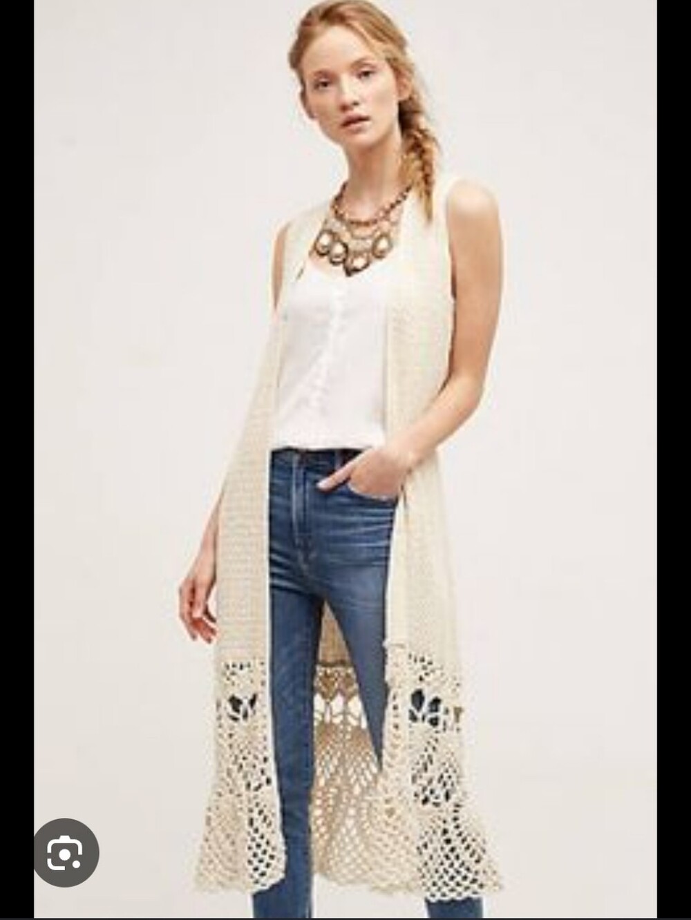 cream crochet duster features a delicate, intricate floral design